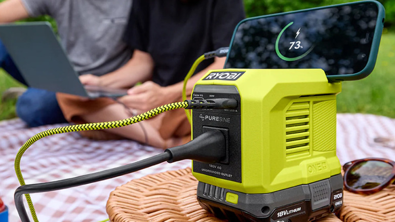 Ryobi power source and a solar panel in the background