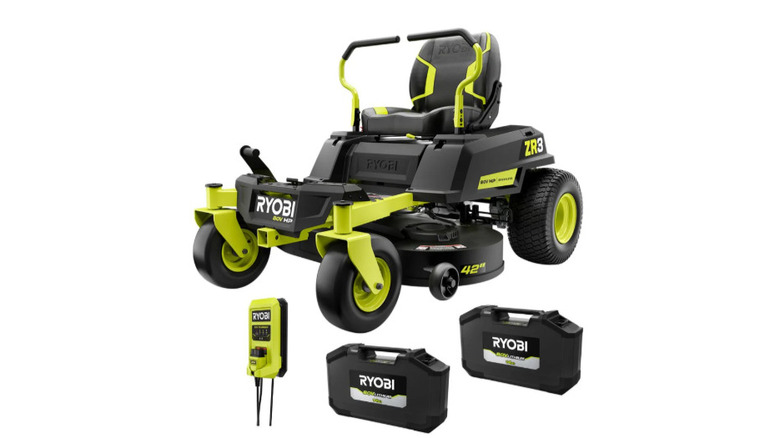 man riding Ryobi zero turn mower