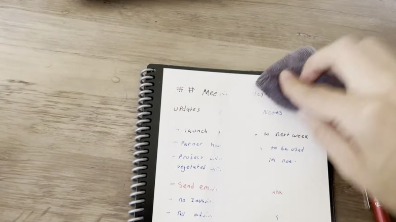 Composite image of Rocketbook ad and product photo