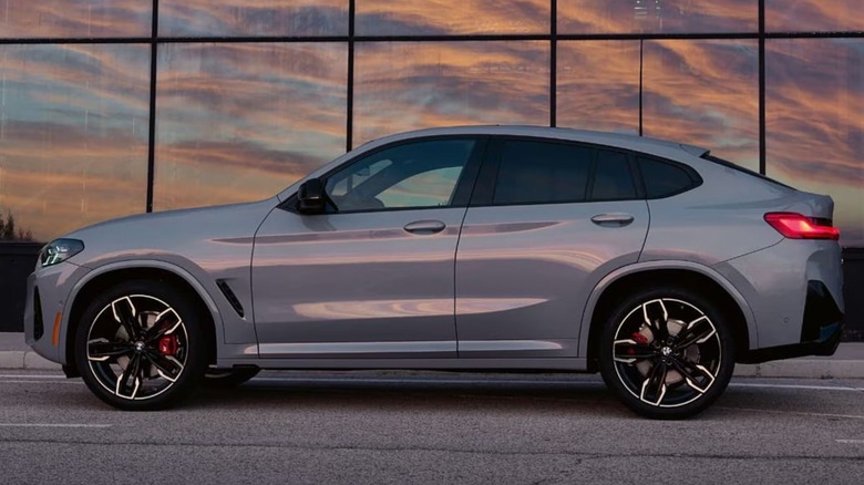 2025 BMW X4 parked in front of building