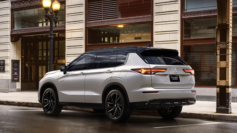 2025 Mitsubishi Outlander﻿ parked in front of business buildings
