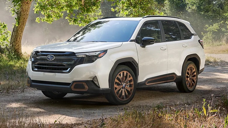 2025 Subaru Forester driving on dirt road