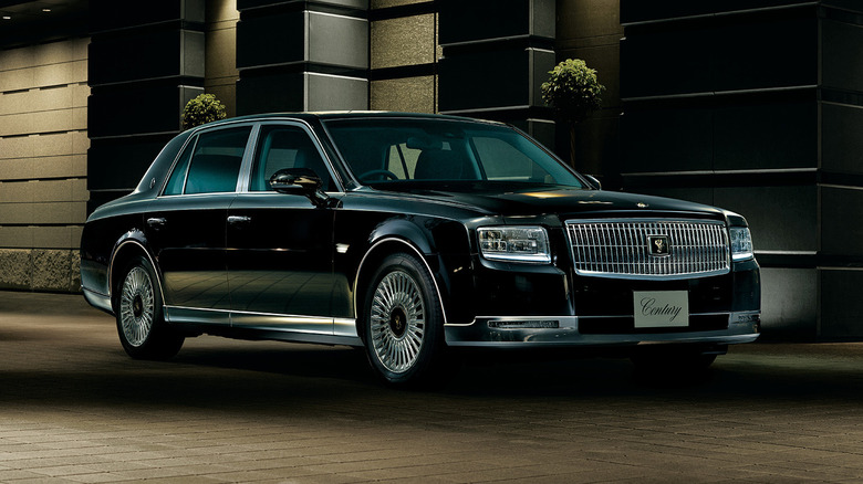 Toyota Century Sedan outside an office at night