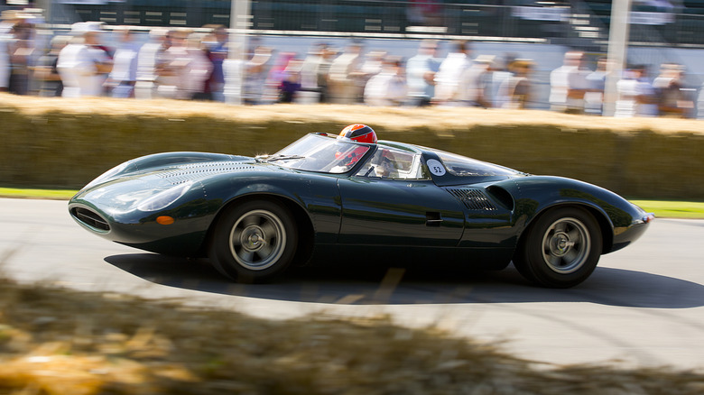 A Jaguar XJ13 racing at Goodwood Festival of Speed.