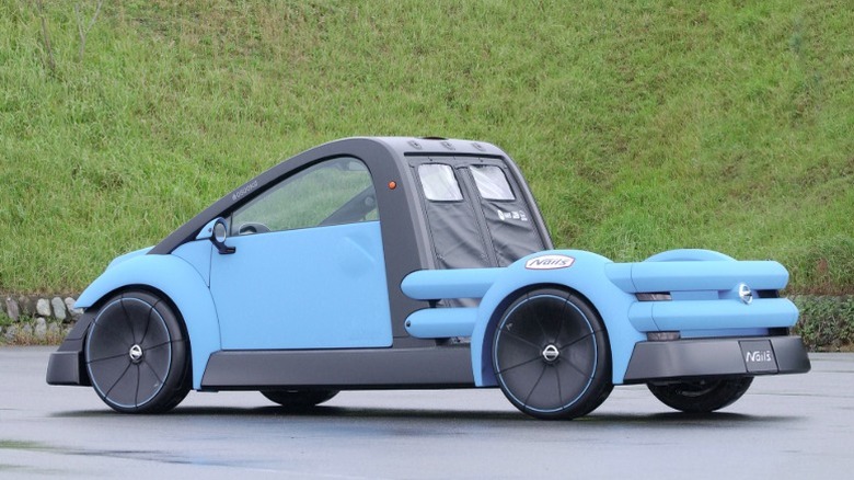 Rear three-quarter view of Nissan Nails concept parked on asphalt