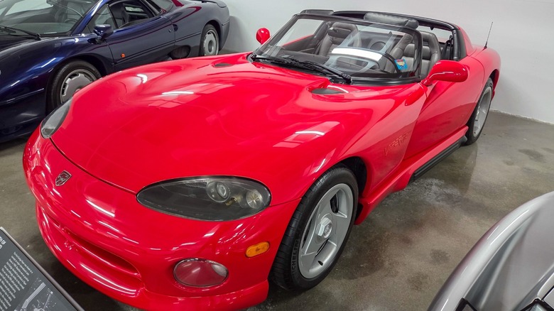 a 1992 Dodge Viper parked at a museum