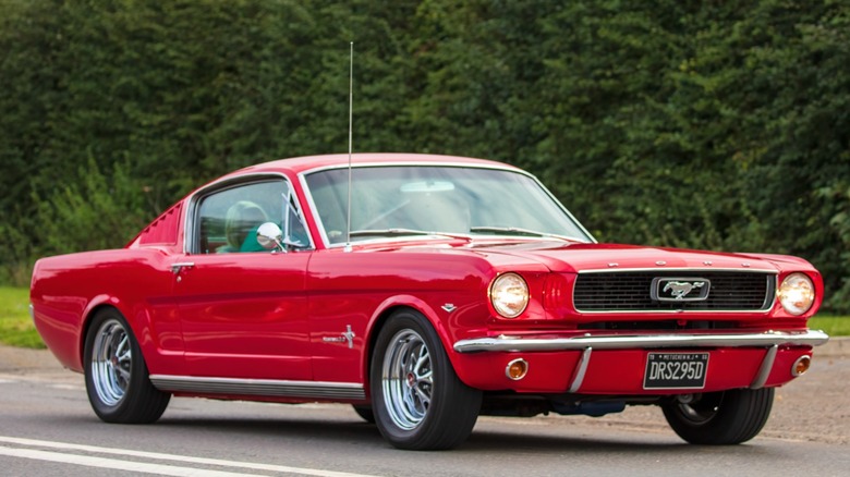 a red first-generation Ford Mustang