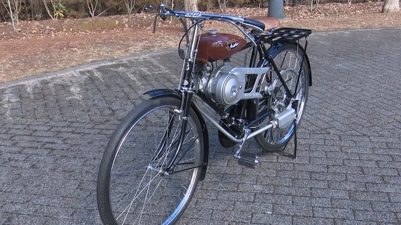 Honda A-Type parked on driveway