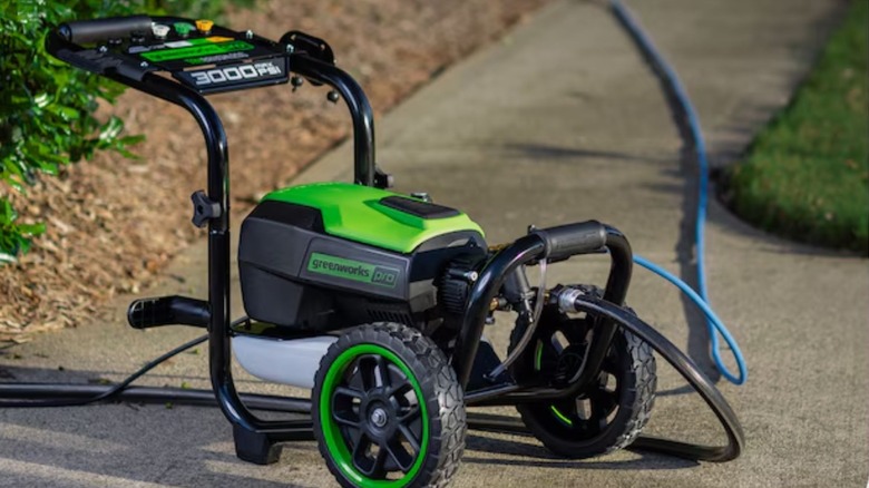 Greenworks 3000 PSI Pressure Washer on sidewalk