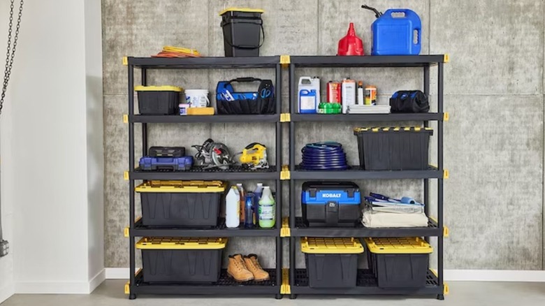two Project Source Shelving units in garage