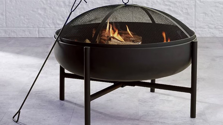 Origin Portable Fire Pit on tile