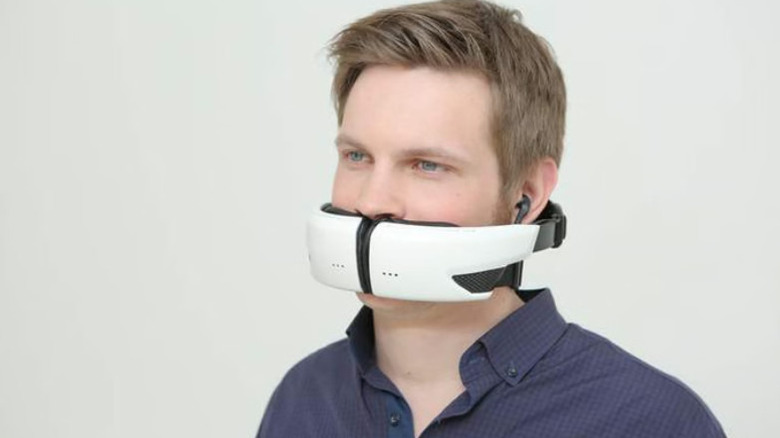 A man with a Hushme around his mouth.