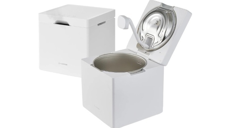 Two CarePod Cube Plus humidifiers, one opened, on a white background