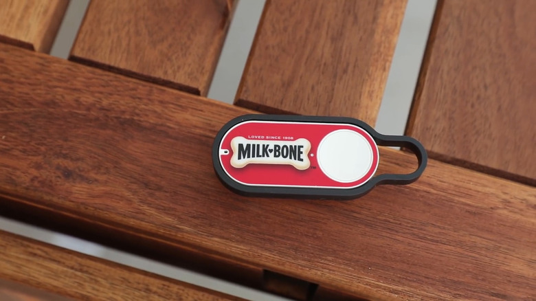An Amazon Dash button for buying milk bone on a table