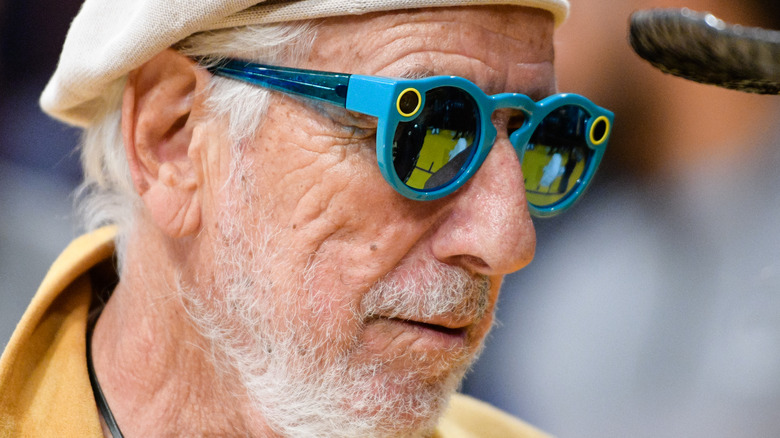 A man wearing Snapchat spectacles