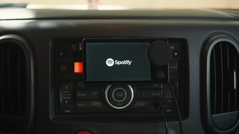 The Spotify car thing mounted on a car dash