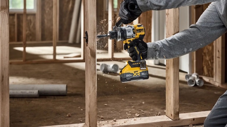 Man using DeWalt DCD1007B Hammer Drill