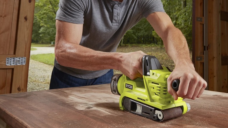 sanding with Ryobi belt sander