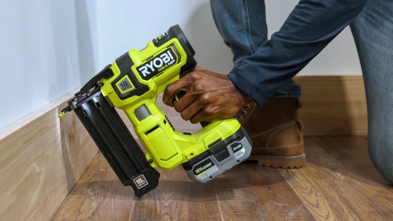 securing baseboards with Ryobi nailer