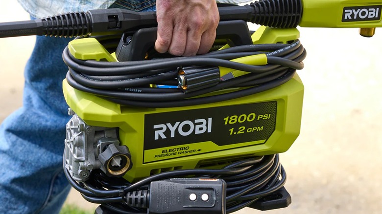 carrying Ryobi pressure washer