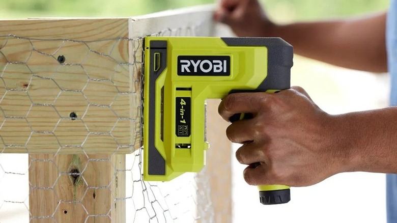 Person using stapler/nailer