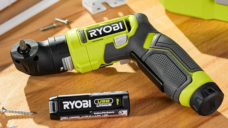 Person using Ryobi multi-head screwdriver