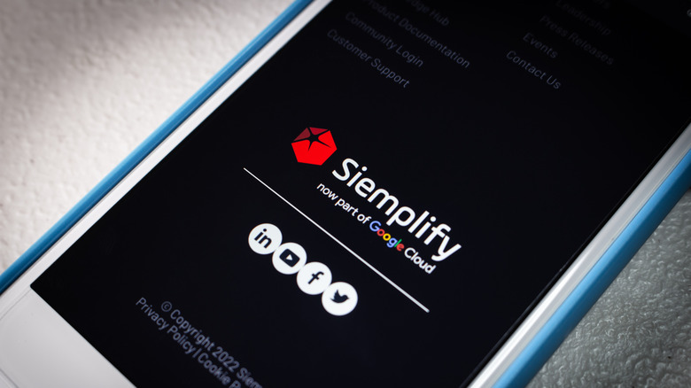 A smartphone screen showing the Siemplify logo, indicating the company is now part of Google.