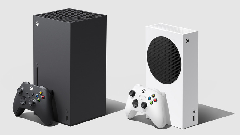 A black Series X and white Series S sit side-by-side with matching controllers.