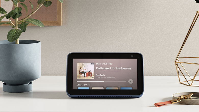 Amazon Echo device showing music playing