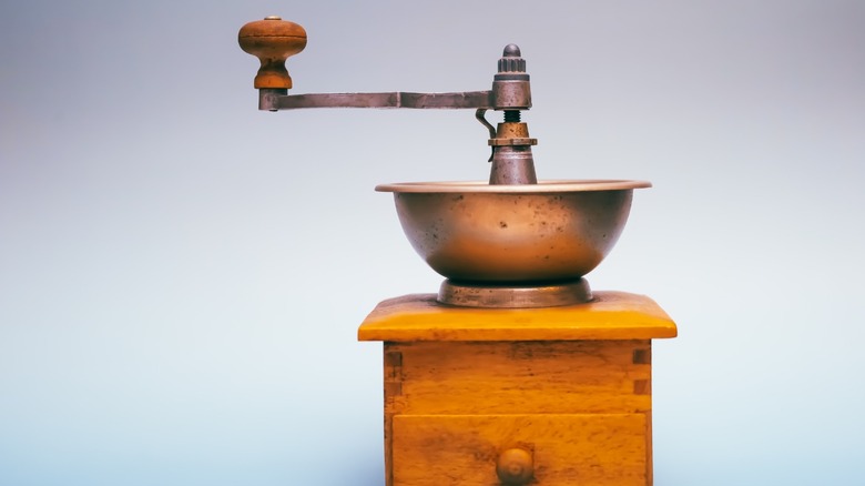Stock photo of an old-fashioned coffee grinder.