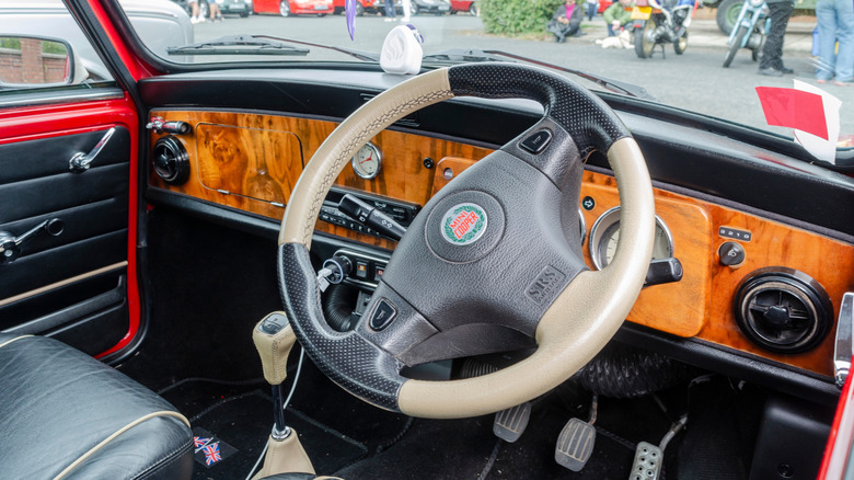 View of a steering with a decal applied to the car logo