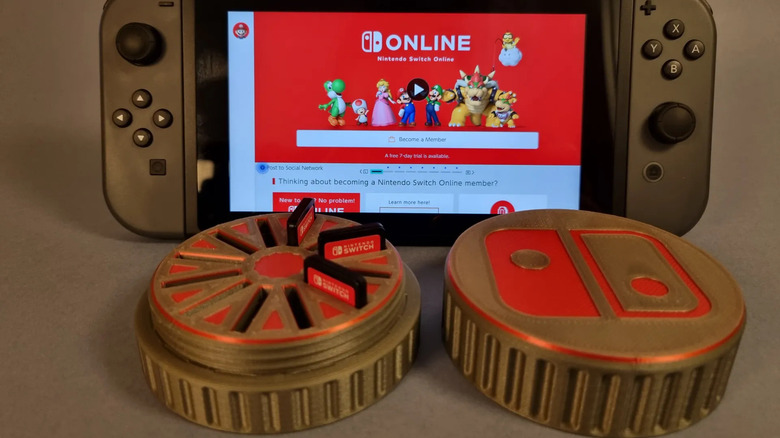 Nintendo Switch game holder in front of a Switch