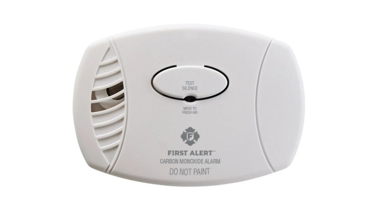 White carbon monoxide detector on a white background