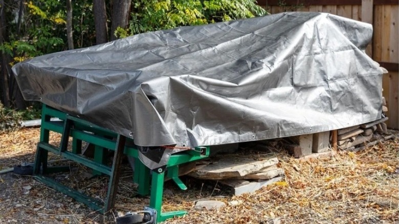 Outdoor area covered with a silver tarp