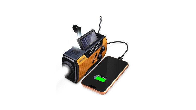 Emergency multi-tool radio charging a smartphone