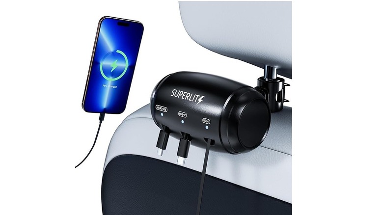 Backseat car charger mounted on a headrest with USB cables