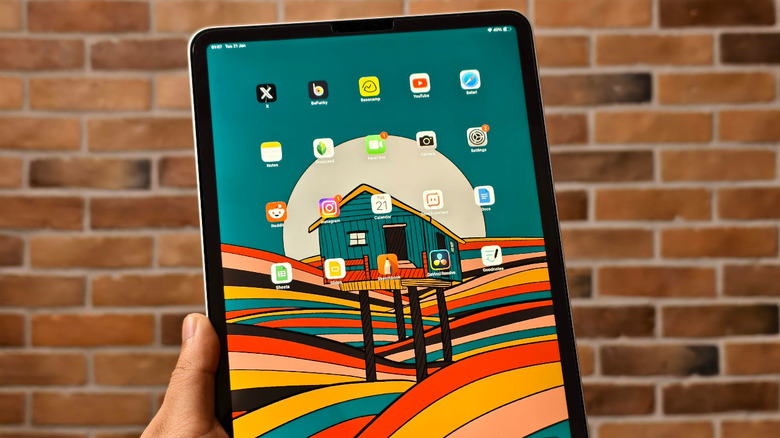 An iPad showing installed apps on the home screen