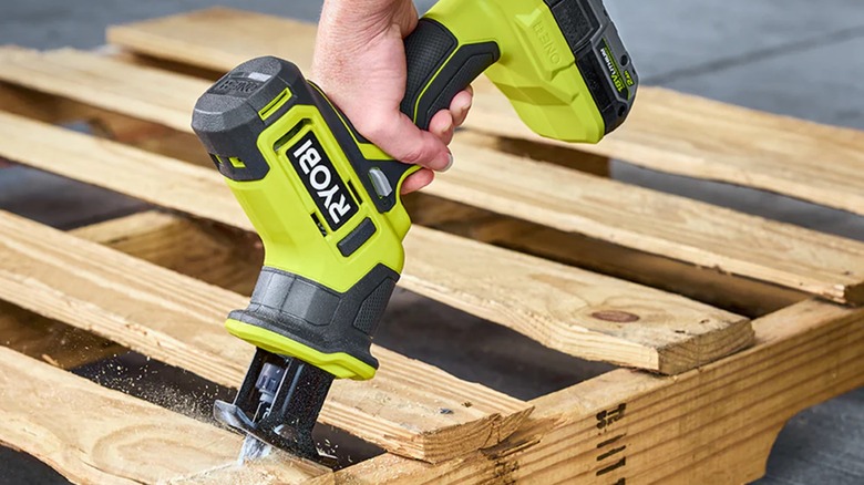 Cutting pallet boards with Ryobi One-Handed Reciprocating Saw.