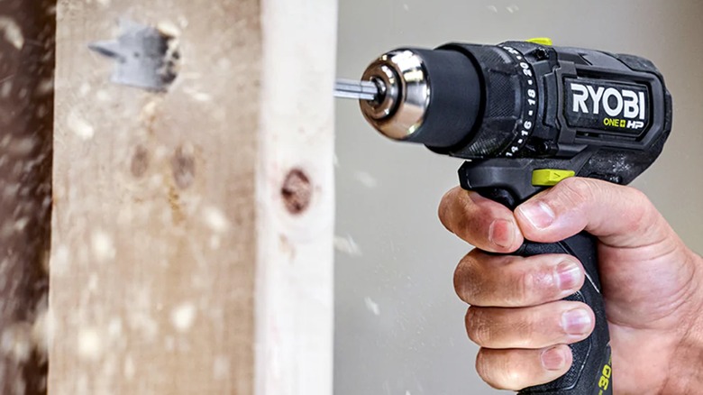 Drilling through board with Ryobi Compact Brushless 1/2-Inch Drill/Driver.