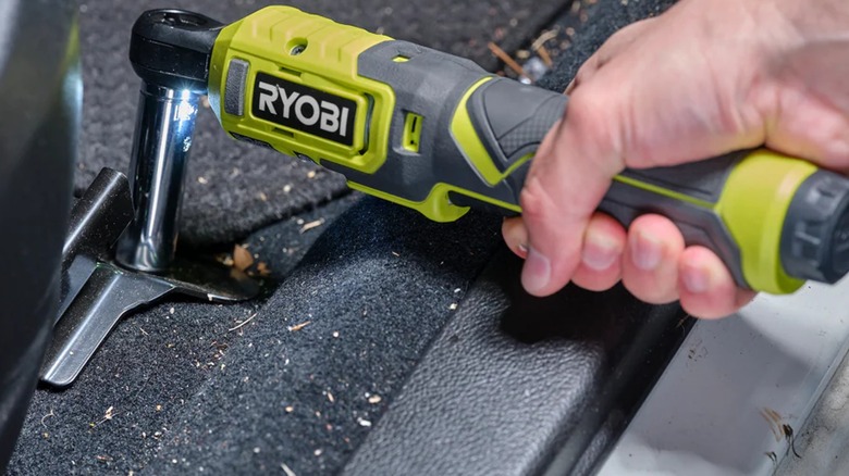 Tightening bolt in car with Ryobi Light Duty Ratchet.