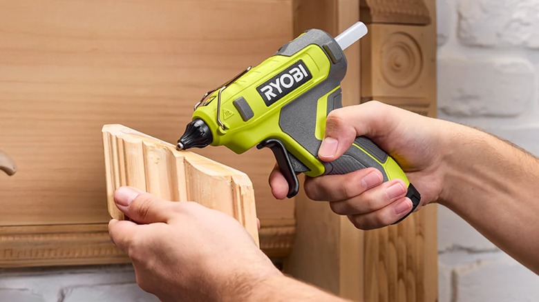 Gluing a trim piece with the Ryobi glue gun.