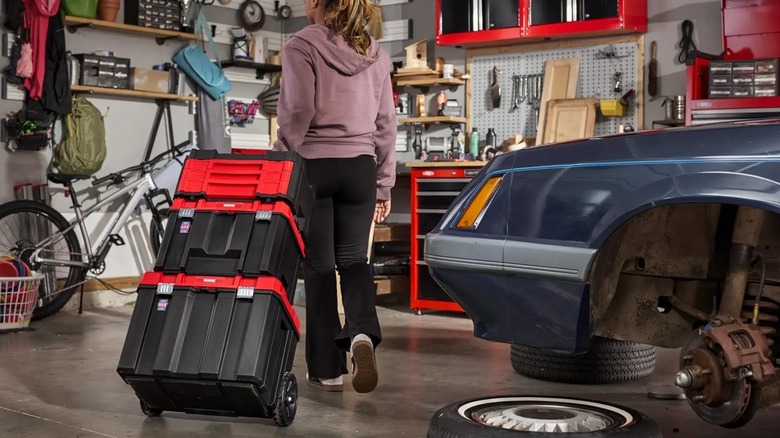 Person pulling modular tool box