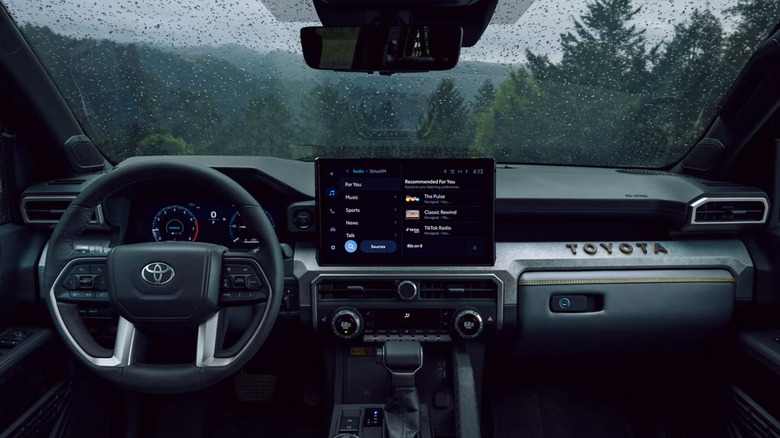 The 2025 Toyota 4Runner interior, center-console prominently in view, finished in black.