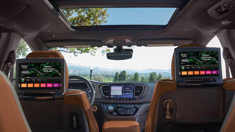 The interior of the 2026 Chrysler Pacifica as seen from the second row, revealing its dual rear screens