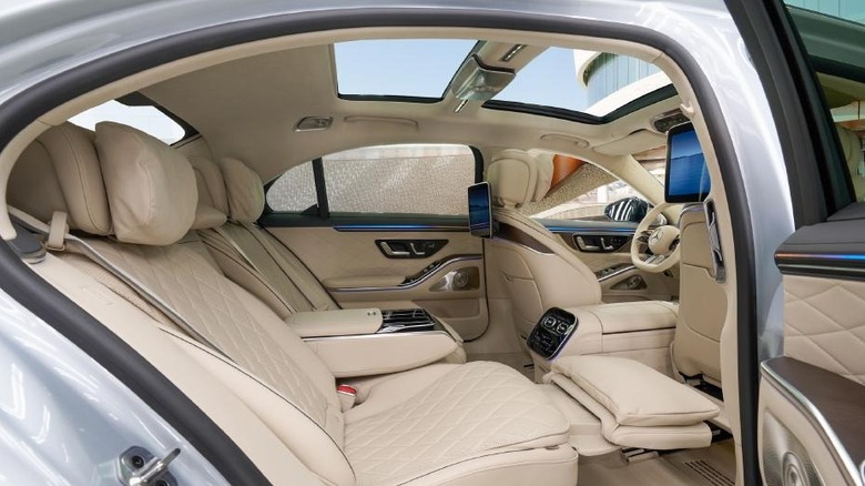 The interior of the 2026 Mercedes-Benz S-Class as seen through the open right passenger rear door