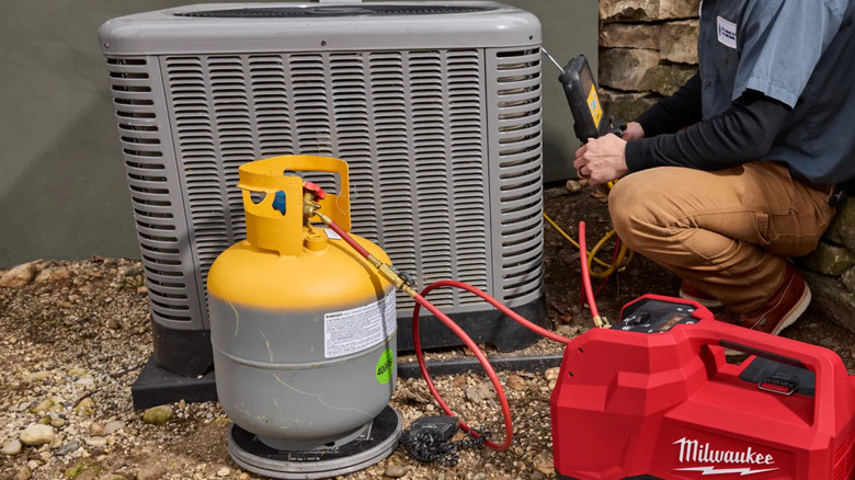 Milwaukee Refrigerant Recovery Machine in use