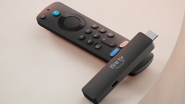 The Amazon Fire TV Stick HD resting on a remote
