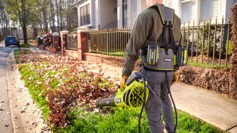 Man wearing Ryobi's belt power supply