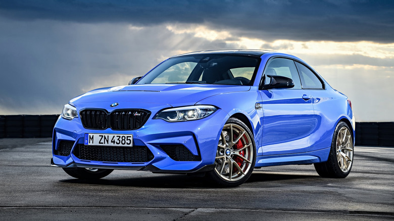A metallic blue BMW M2 CS parked.