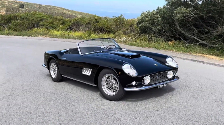 A black Ferrari 250 California parked